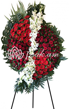 Condolence wreath of red and white flowers Condolence wreath of red and white flowers
